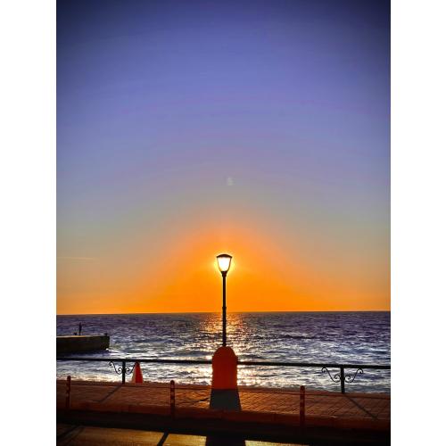 Sunset in Rhodes, well timed with street lamp