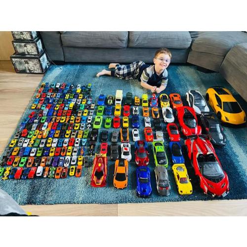 My cheeky monkey grandson who is obsessed with cars.