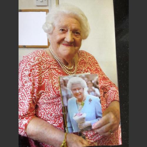 Mum getting her 100th birthday card from Queen Elizabeth