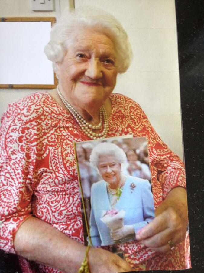 Mum getting her 100th birthday card from Queen Elizabeth