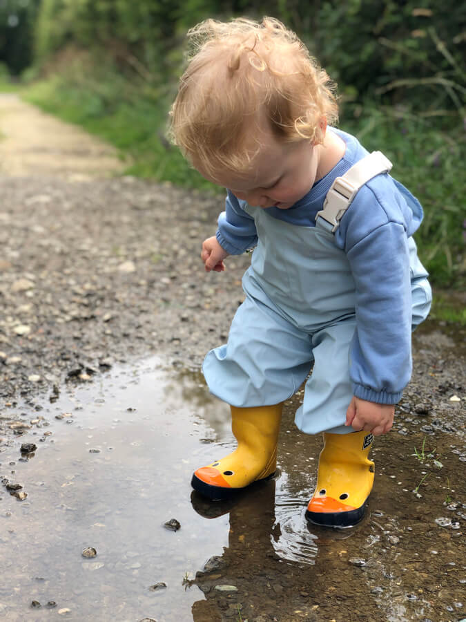 Toddler fun! My 1 year old enjoying his first puddle splash