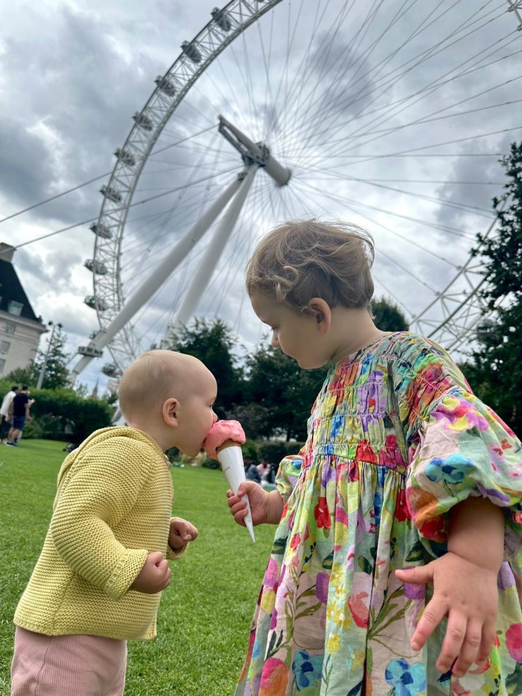 Love watching your granddaughter sharing her ice cream with her younger sister